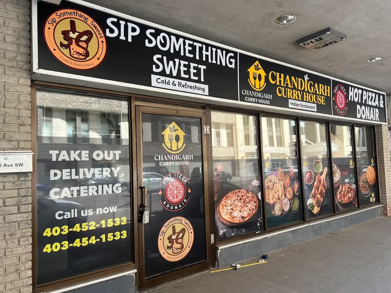 Chandigarh Curry House storefront at 915 6 Ave SW, Calgary AB — Indian restaurant signage with take out, delivery and catering